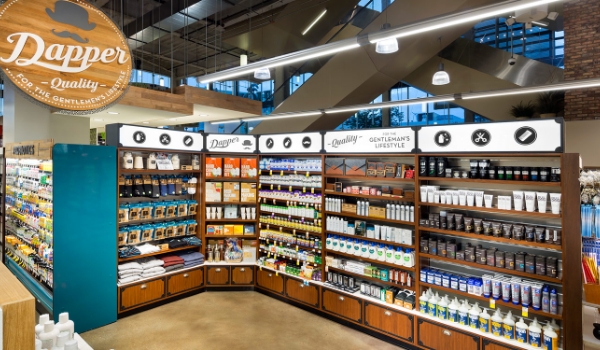 Whole Foods supermarket uses innovative visual merchandising to attract customers & offer them a local feel