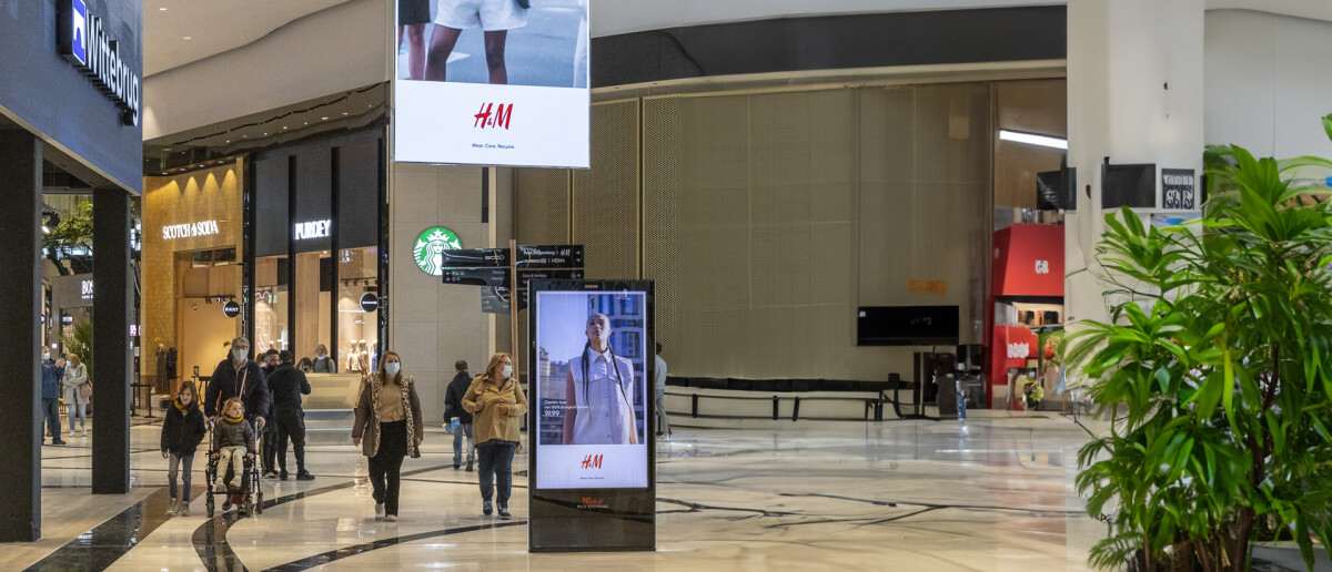 A shopping space showing digital signage screens in Dubai