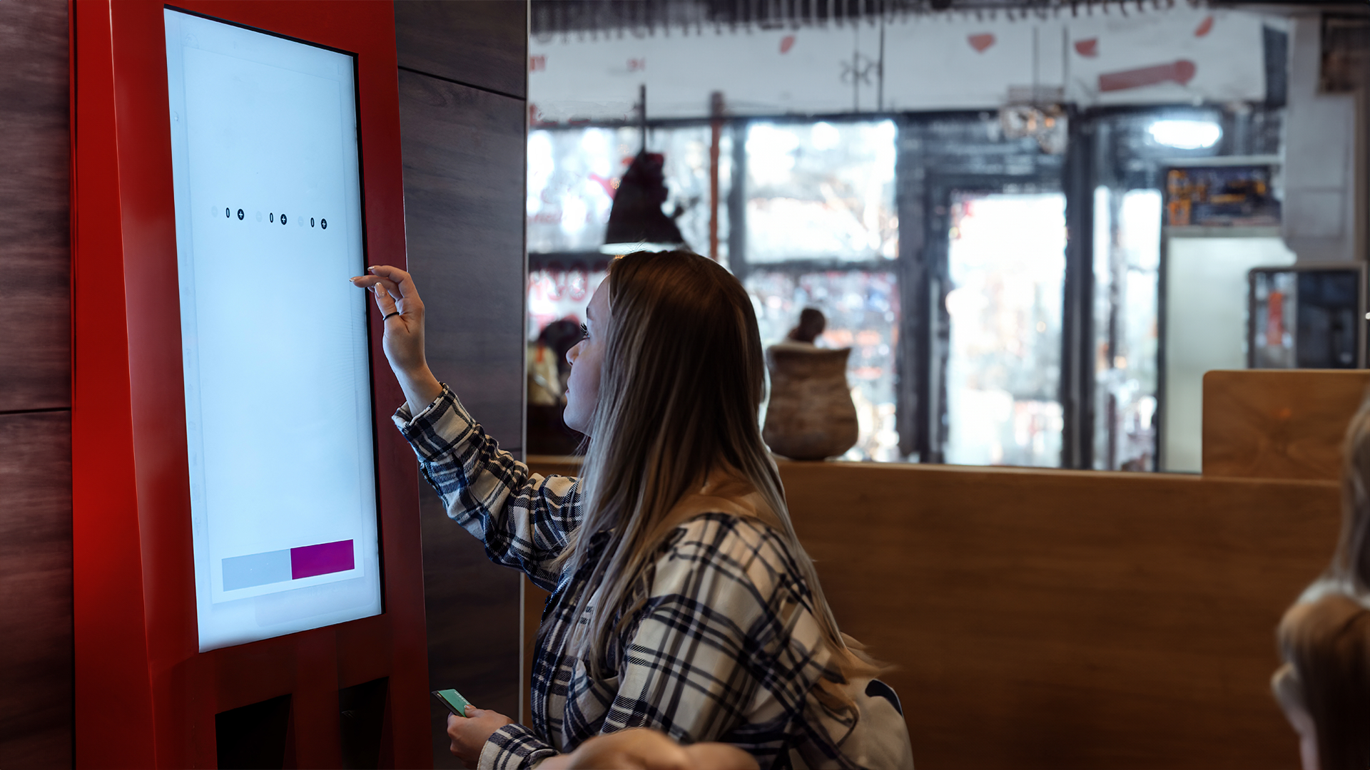 Digital signage integrated with a hospitality app