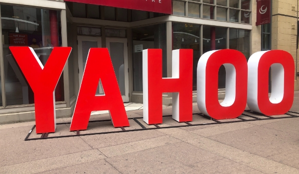 The name Yahoo is built with red channel letters & placed outside the Yahoo office entrance