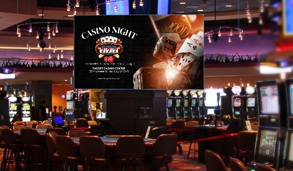 A large LCD TV screen inside a casino gaming arena promotes a special 'Casino Night